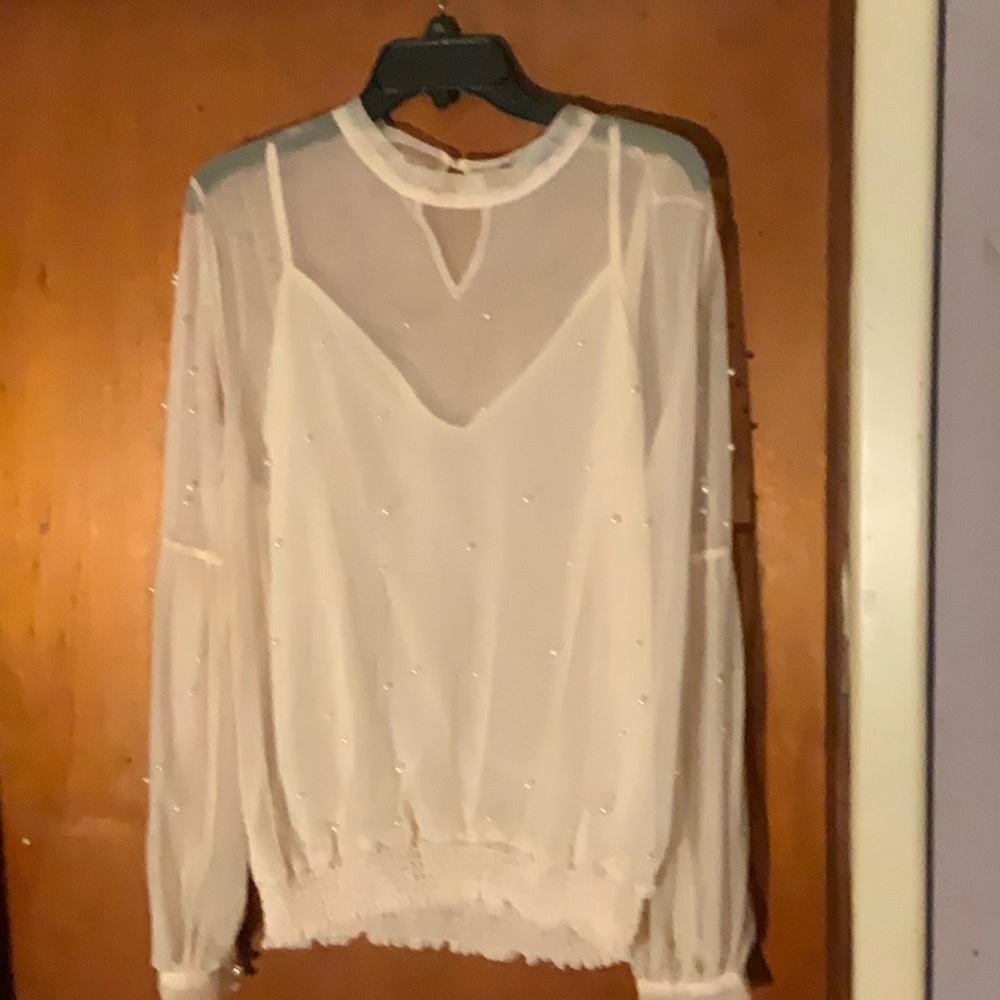 Beautiful chiffon top accented with pearls